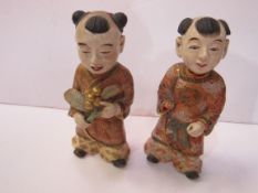 2 Satsuma figurines, as found, height 19cms. Estimate £100-200.