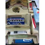 3 boxed vintage model cars; 12 Days Gone buses (all boxed).