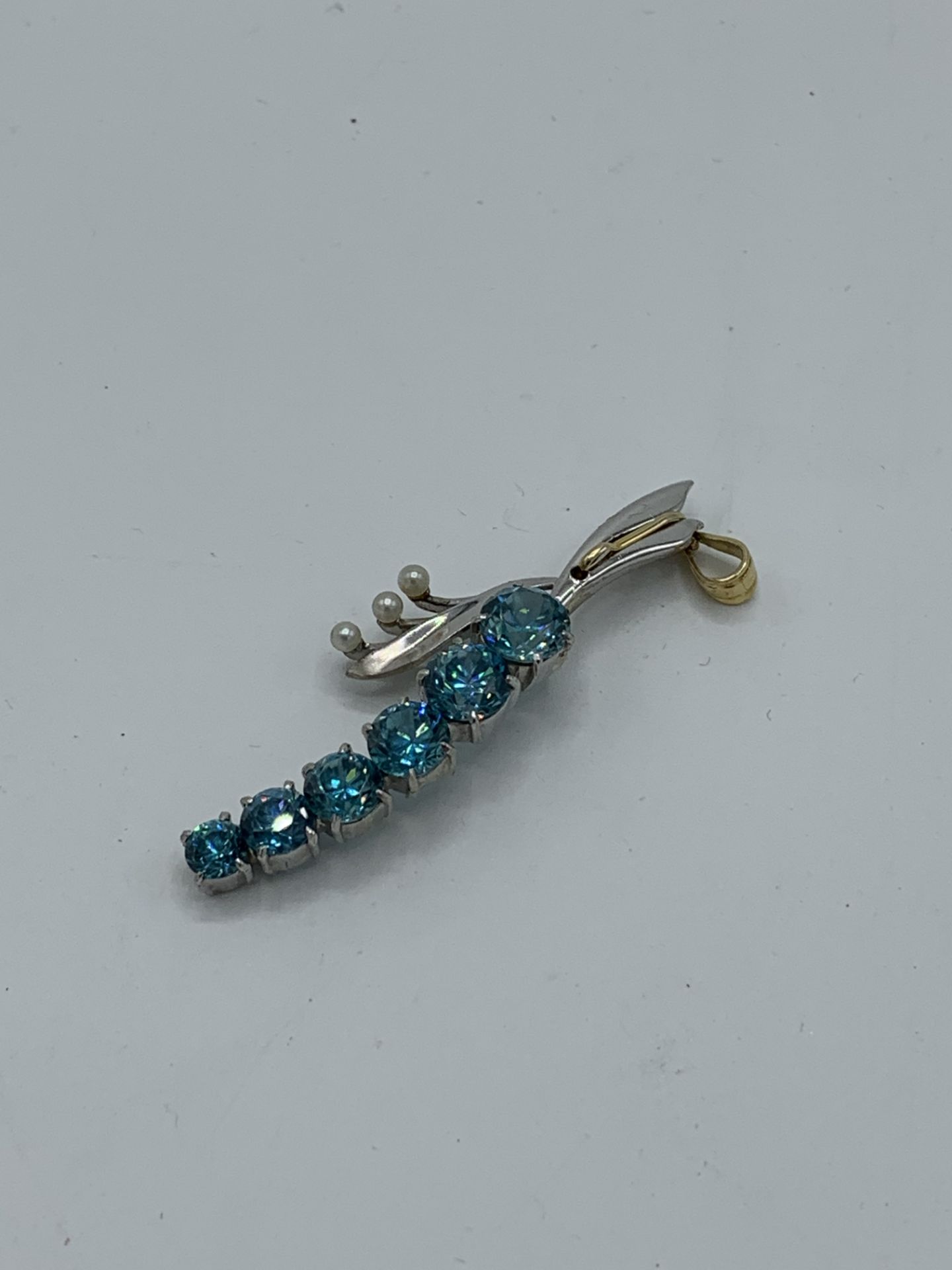 Blue zircons and pearl pendant. Estimate £300-350. - Image 2 of 2