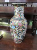 Tall Chinese vase heavily gilded famille rose. Estimate £20-40.