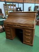 Late 19th Century/early 20th Century oak roll-top top pedestal desk, 138 x 86 x 130cms. Estimate £