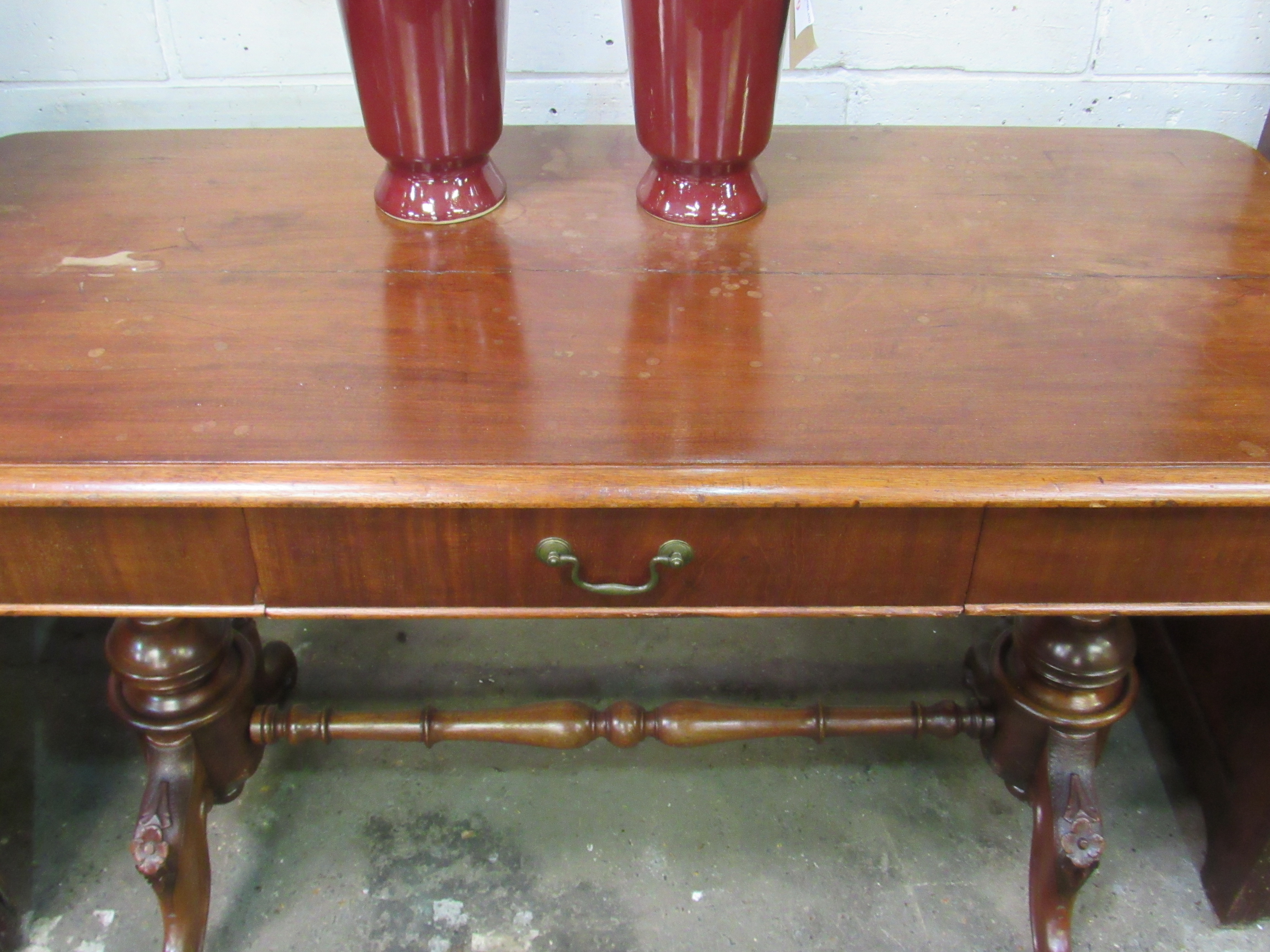 Mahogany library table with frieze drawer on turned stretcher to twin pedestals. 122 x 57 x 75cms. - Image 2 of 5