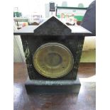 Slate and marble cased mantel clock by Ansonia Clock Co. with visible escapement. Estimate £20-30.