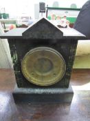 Slate and marble cased mantel clock by Ansonia Clock Co. with visible escapement. Estimate £20-30.