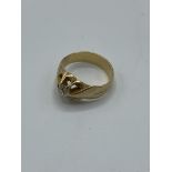 Yellow metal and diamond ring, size J, weight 5.2gms. Estimate £150-180.