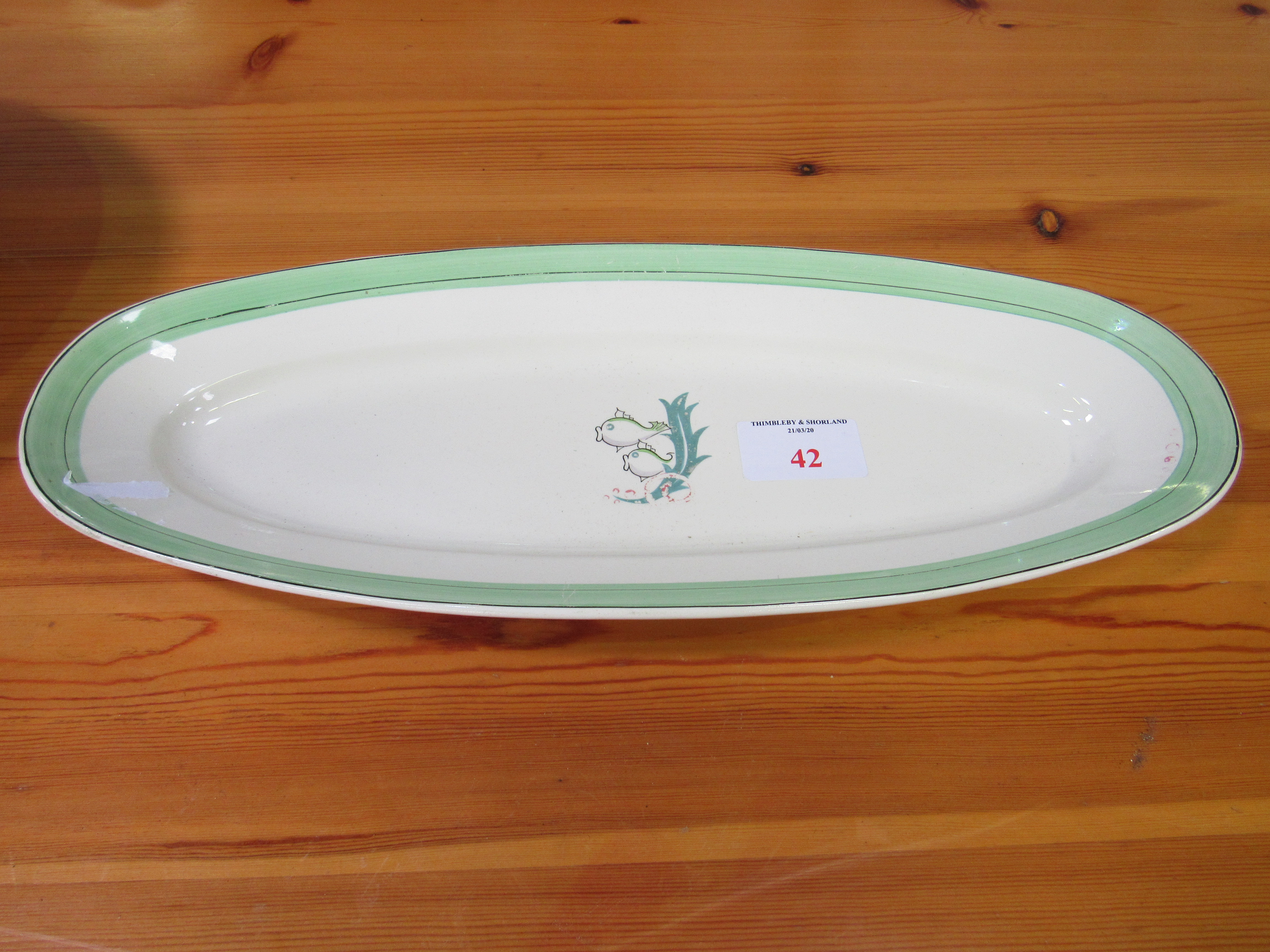 Clarice Cliff fish serving dish, length 57cms, together a Victorian wash bowl 39cms diameter.