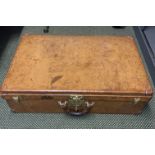 Louis Vuitton leather suitcase with brass lock and catches, complete with key. Lock number 037126.