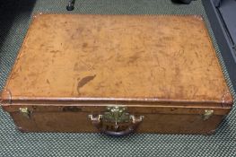 Louis Vuitton leather suitcase with brass lock and catches, complete with key. Lock number 037126.