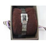 Gucci Lady's Dress Watch, having code number, in jeweller's display box. Estimate £30-50.