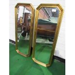 2 gilt framed tall wall mirrors, 130 x 50cms. Estimate £30-50.