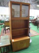 G Plan display unit with cupboard below, 82 x 46 x 198cms. Estimate £25-40.