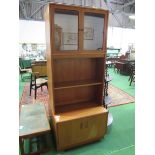 G Plan display unit with cupboard below, 82 x 46 x 198cms. Estimate £25-40.