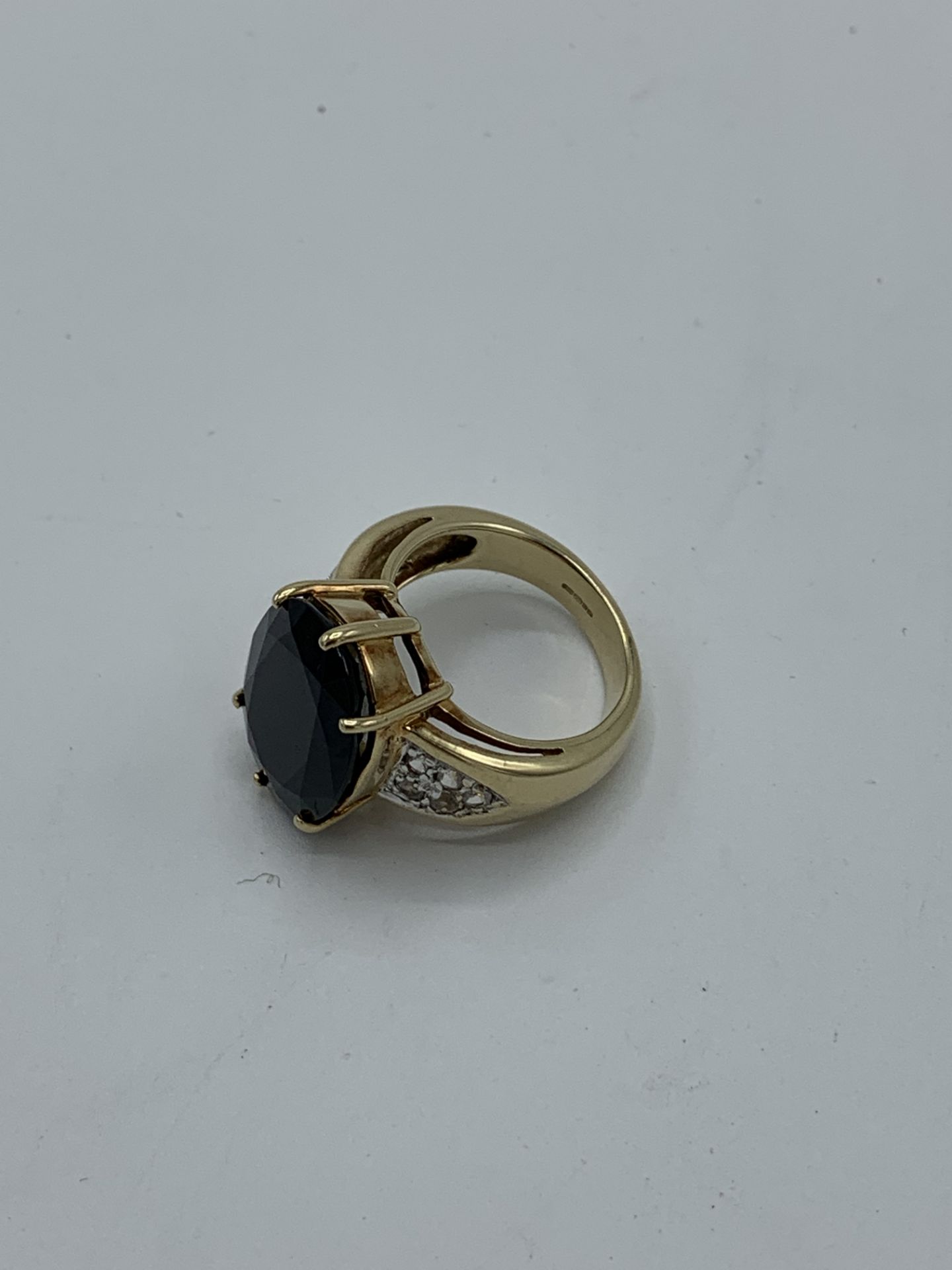 9ct gold ring with large centre sapphire and white sapphires to shoulders, weight 10.5gms, size N - Image 2 of 2