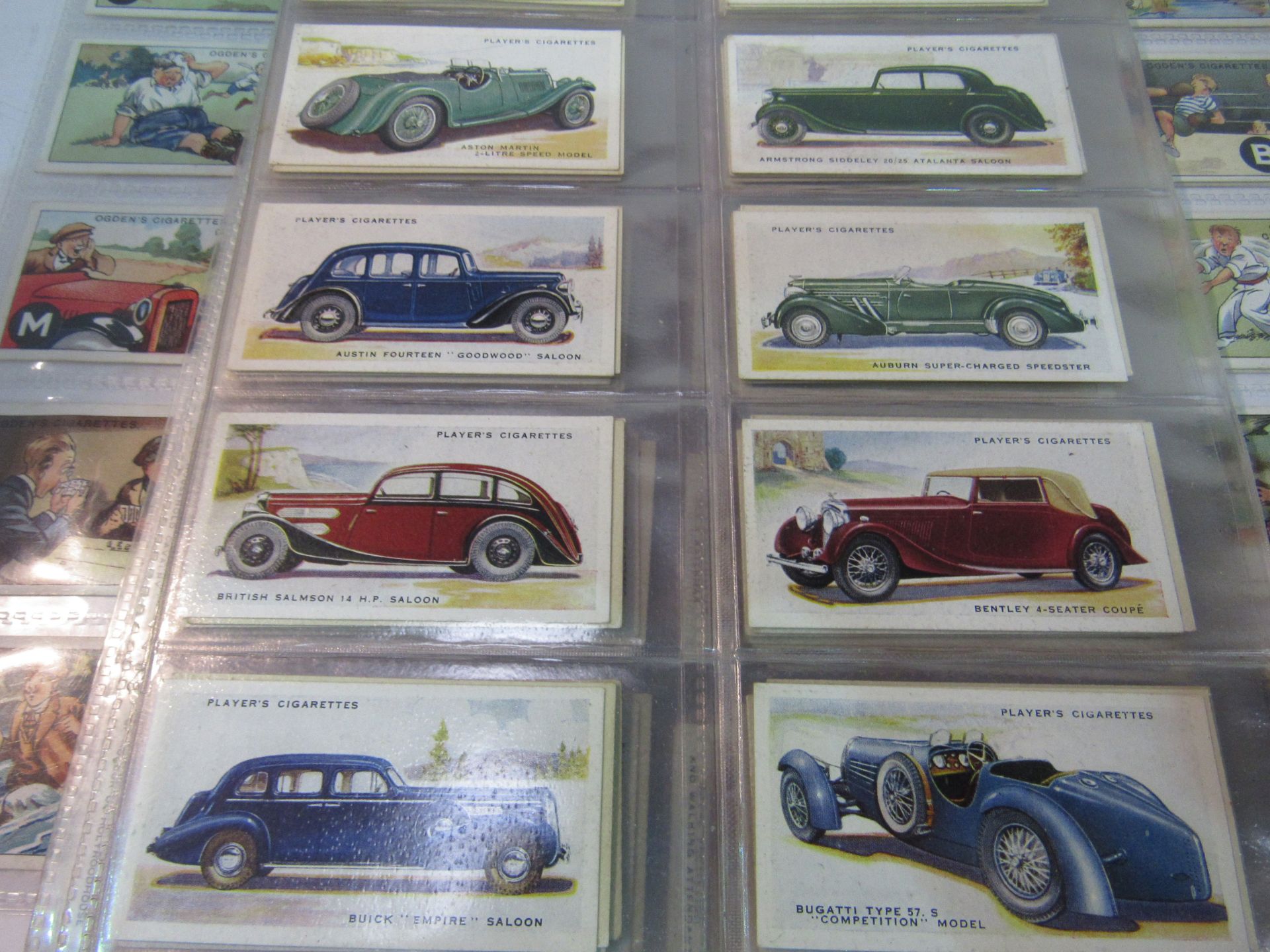 4 sets of cigarette cards; John Players, Coronation and Motor cars; Ogdens Sport and Bird eggs.