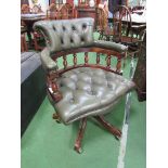 Modern green button leather Captain's chair. Estimate £40-60.