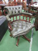 Modern green button leather Captain's chair. Estimate £40-60.