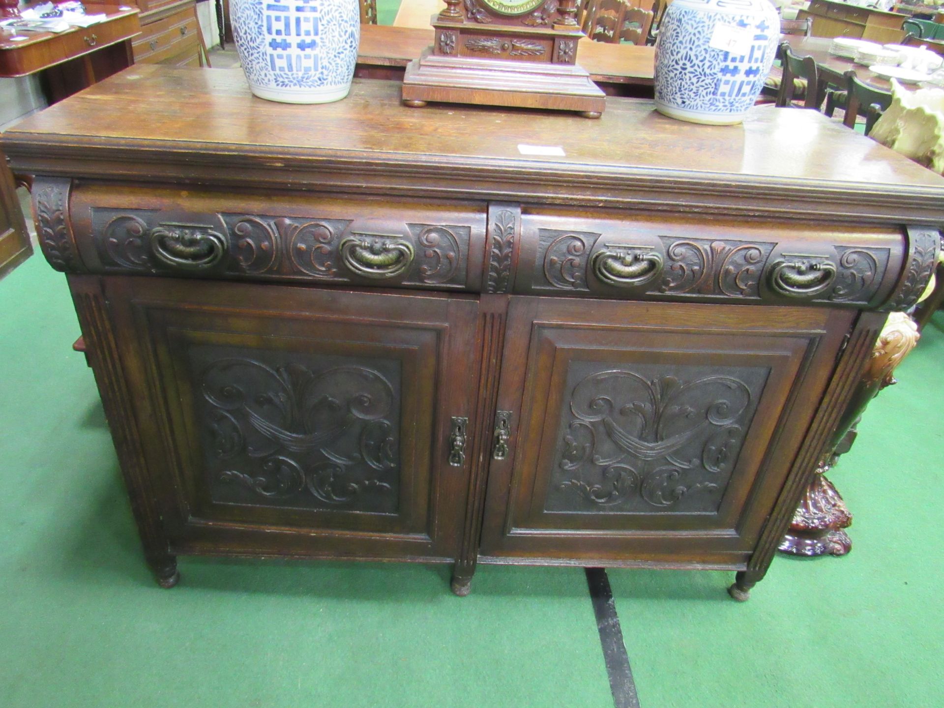 Oak sideboard with carved drawers and cupboard doors, 137 x 53 x 98cms. Estimate £10-20 - Image 2 of 5