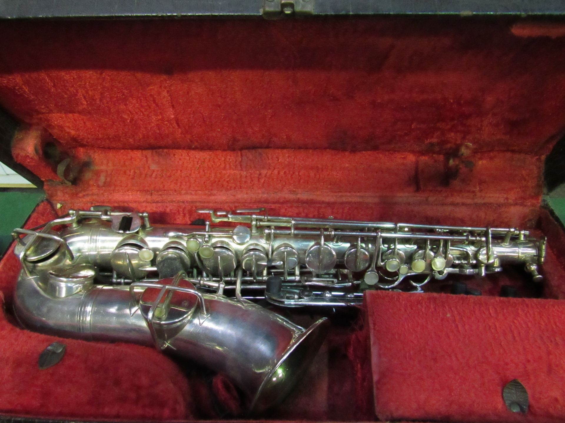 Vintage alto Saxophone engraved Lewin Bros, London, probably manufactured by Martin in the USA.