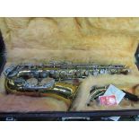 Parrot Alto saxophone with case. Estimate £40-60.