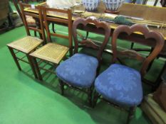 2 cane seat chairs and 2 mahogany framed dining chairs. Estimate £10-20.