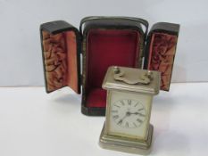 Miniature silver cased carriage clock by Ansonia Clock Co. New York in original leather-covered