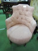 Coral coloured upholstered Victorian tub chair. Estimate £20-30.