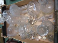 9 various cut and etched decanters, small bottle and quantity of stoppers, height from 24-28cms.
