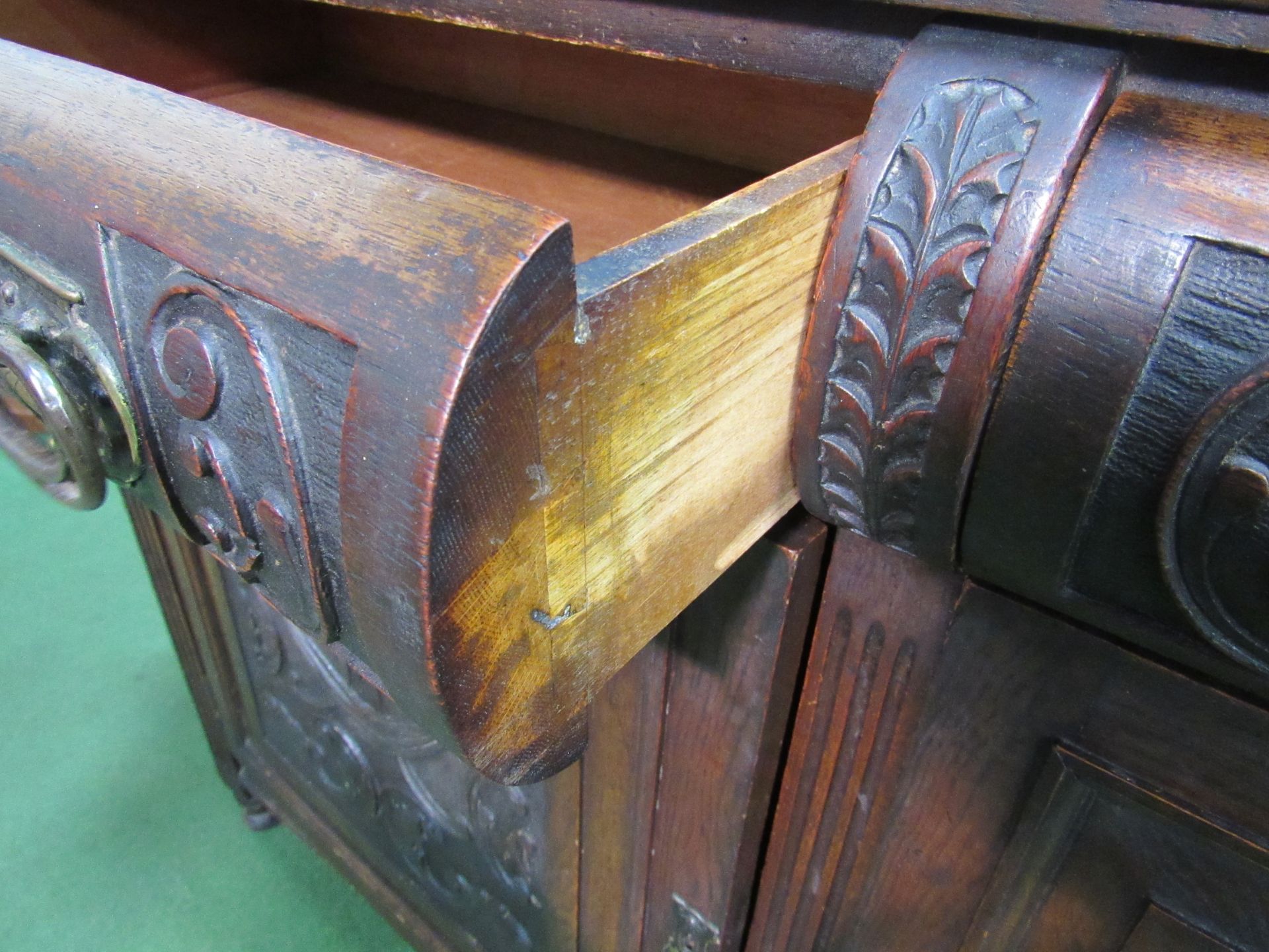 Oak sideboard with carved drawers and cupboard doors, 137 x 53 x 98cms. Estimate £10-20 - Image 3 of 5