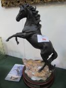 Royal Doulton Cancara Lloyds Bank Black horse with stand. Estimate £120-150.