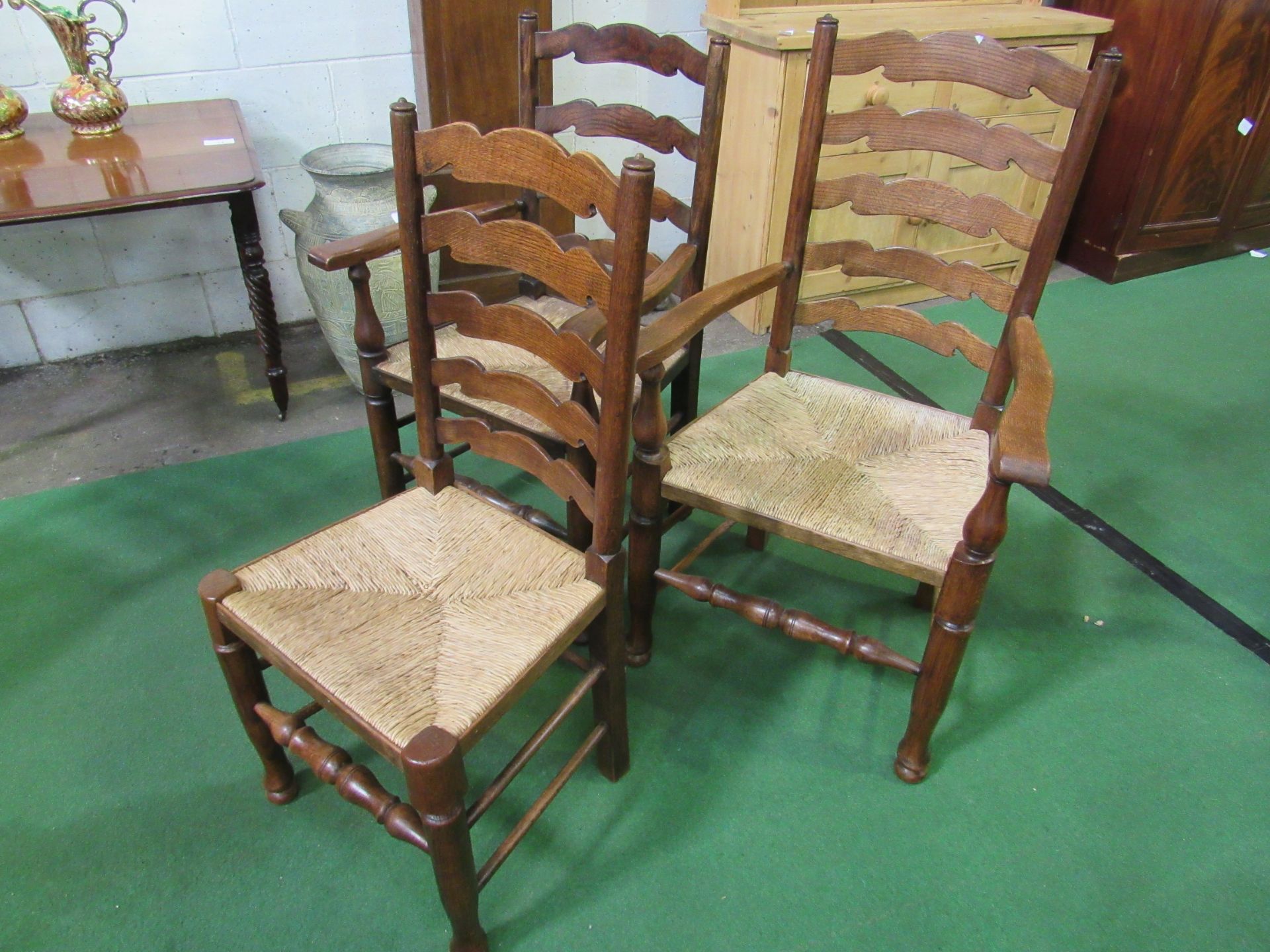 Set of 6 chairs and 2 carvers, mix of oak and elm ladder back with string seats, together with 3