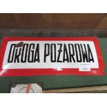 Large domed shape Polish enamel sign. ""Fire Escape"" in red and white. Estimate £50-80.