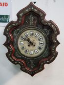 Circa 1850's, French ""Oeil de Boeuf"" Vineyard Clock with mother of pearl inlays. Estimate £80-100.