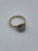 18ct gold solitaire diamond ring, size J, weight 2.6gms. Estimate £150-180.