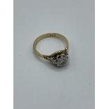 18ct gold solitaire diamond ring, size J, weight 2.6gms. Estimate £150-180.