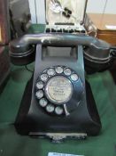 Black bakerlite GPO telephone, model number B32F. Estimate £40-50.