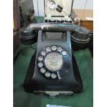 Black bakerlite GPO telephone, model number B32F. Estimate £40-50.