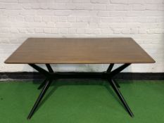 1950's E. Gomme G-Plan ""Helicopter"" table, on stylised ebonised legs, 137 x 76 x 75cms.