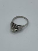 Platinum large old cut diamond ring with diamonds to shoulders, weight 4.8gms, size R. Estimate £