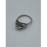 Platinum large old cut diamond ring with diamonds to shoulders, weight 4.8gms, size R. Estimate £
