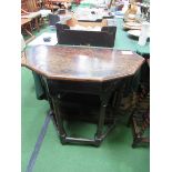 Oak side table with shaped top on stretchers, 75 x 36 x 78cms. Estimate £10-20.