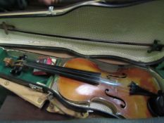 3 violins in cases as found. Estimate £20-40.