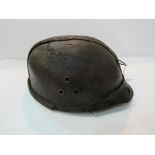 Rare WW1, Belgian Child Soldier's leather helmet. Estimate £50-80.