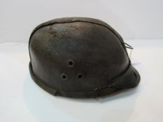 Rare WW1, Belgian Child Soldier's leather helmet. Estimate £50-80.