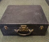 Louis Vuitton fitted dressing case, black textured leather exterior with brass lock and catches.