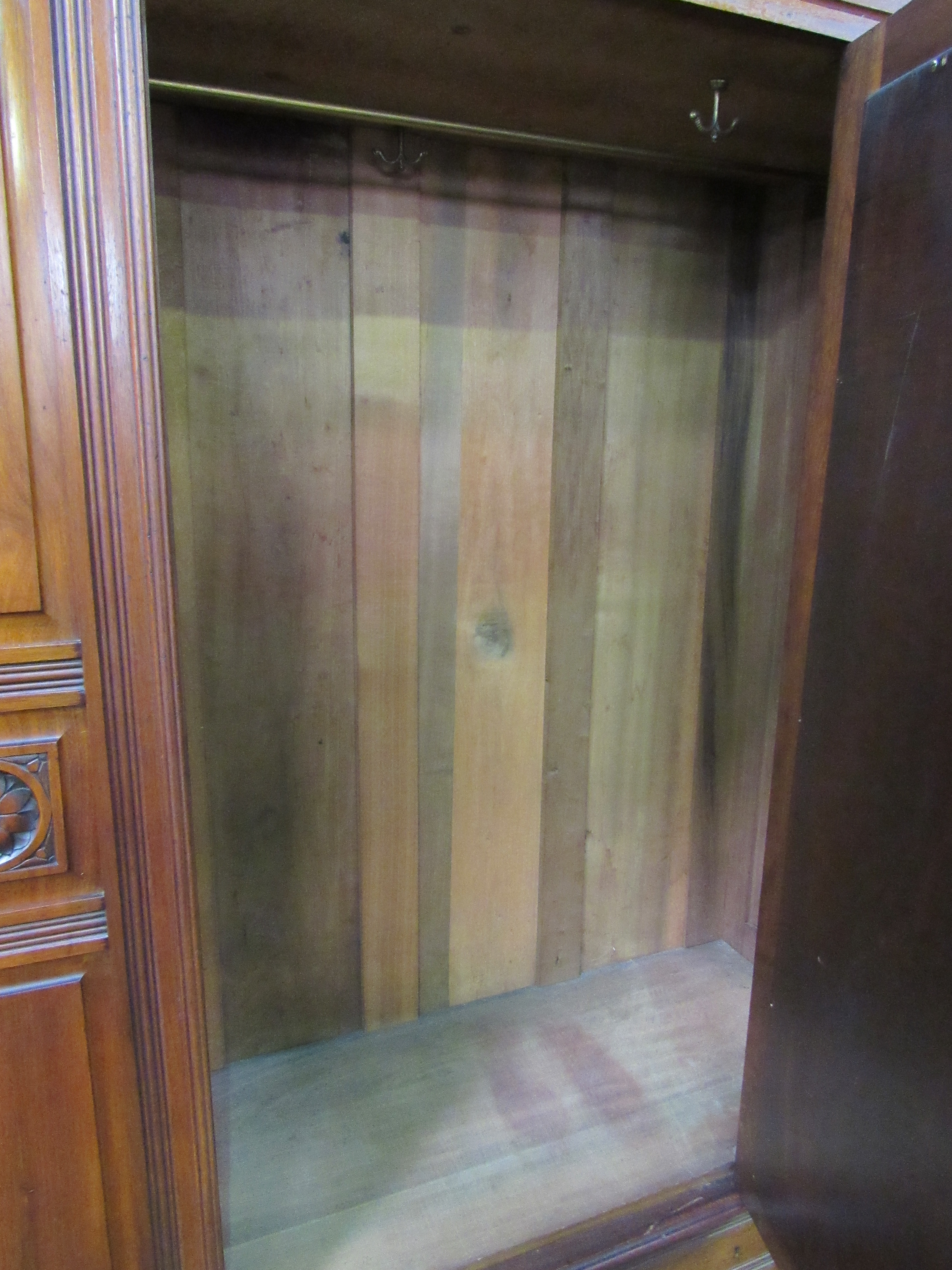 Edwardian mahogany wardrobe with mirror door above 2 over 1 drawers. 132 x 51 x 207cms. Estimate £ - Image 4 of 5