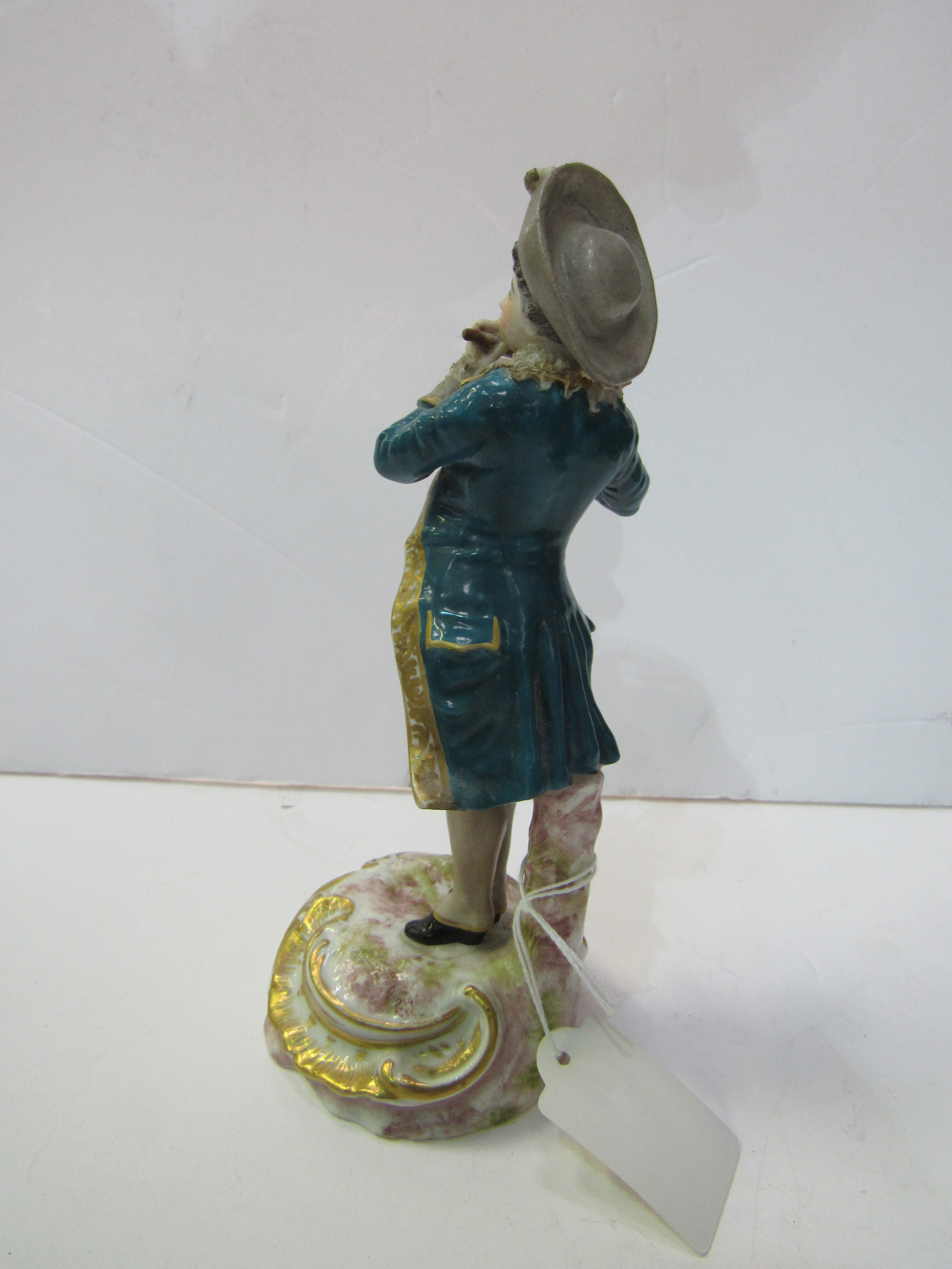 19th Century Meissen figure of a man playing a flute. Estimate £60-80. - Image 2 of 2