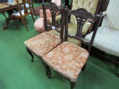 4 Mahogany framed open splat dining chairs. Estimate £20-30.