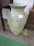 Large Egyptian-style vase. Height 64cms. Estimate £30-40.