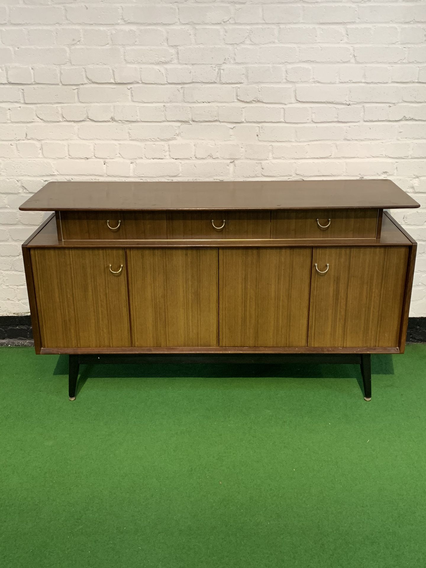 1950's 4 E. Gomme G-Plan sideboard, Tola and Black range. Made of Tola wood (African mahogany)