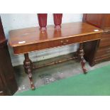 Mahogany library table with frieze drawer on turned stretcher to twin pedestals. 122 x 57 x 75cms.